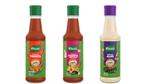 Três molhos Knorr em garrafa: chili, chili com alho, e alho.